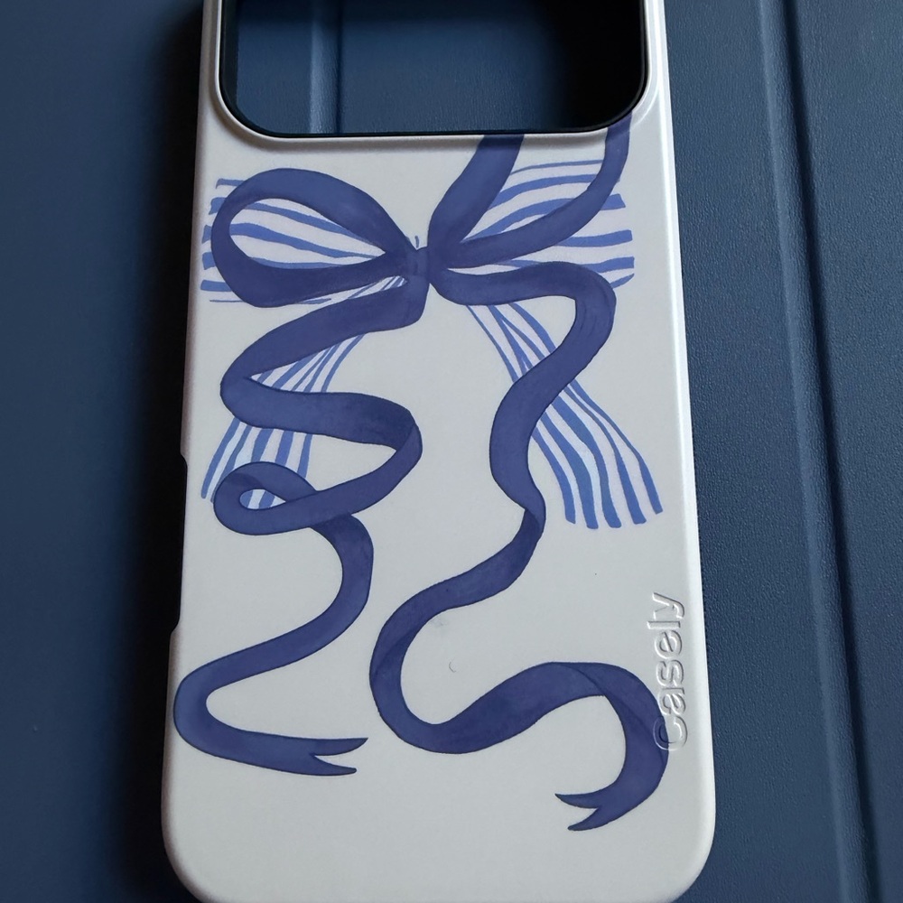 iPhone 17 Pro Max Casely White Phone Case with Blue Ribbon Design